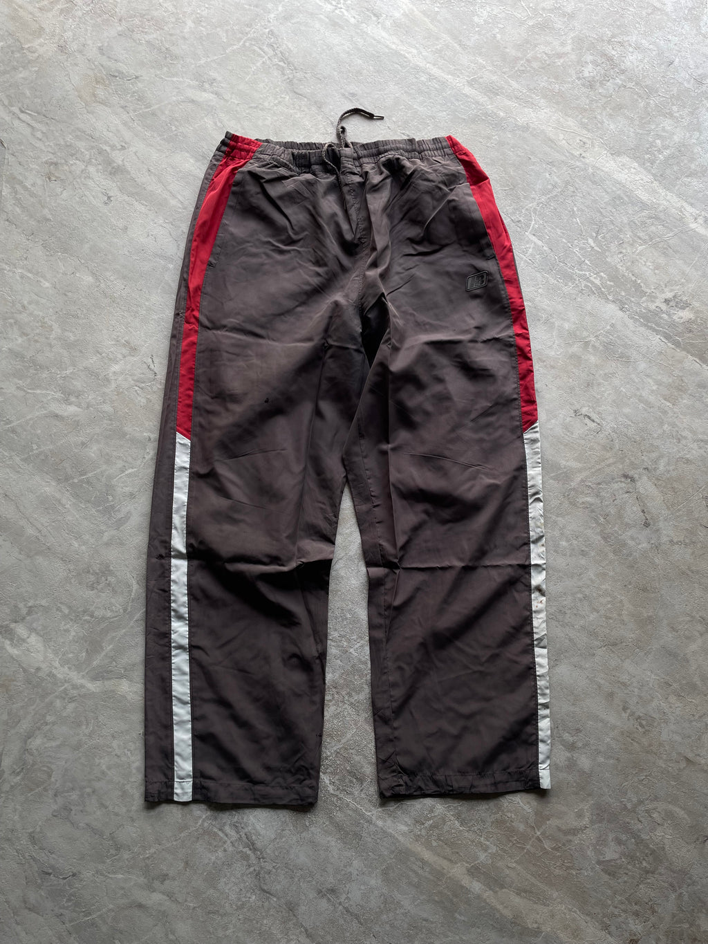 BROWN NEW BALANCE TRACK PANT