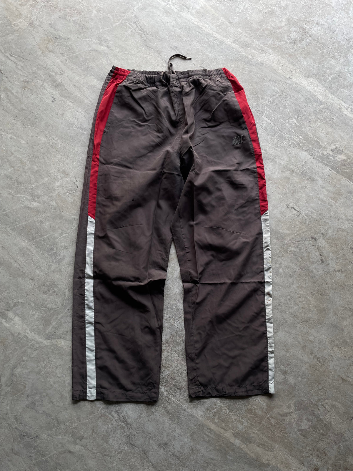 BROWN NEW BALANCE TRACK PANT