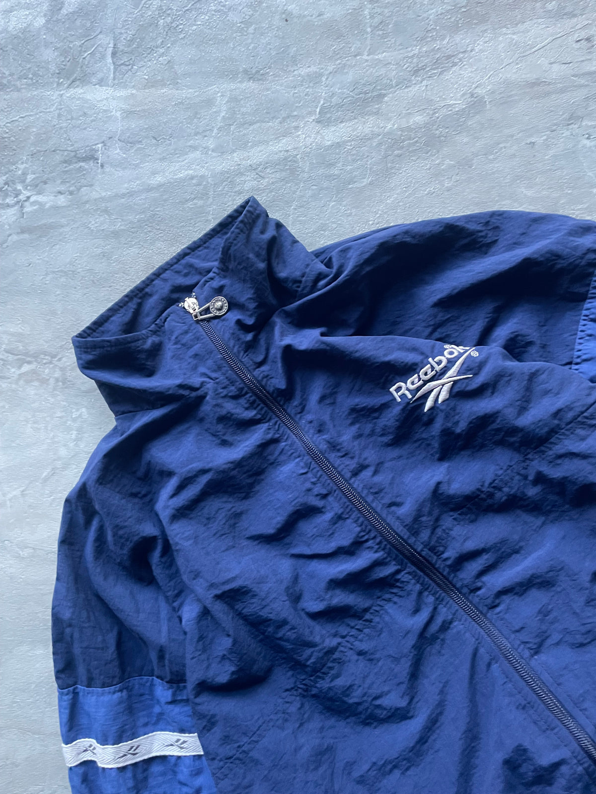 DARK BLUE REEBOK WINDBREAKER-L