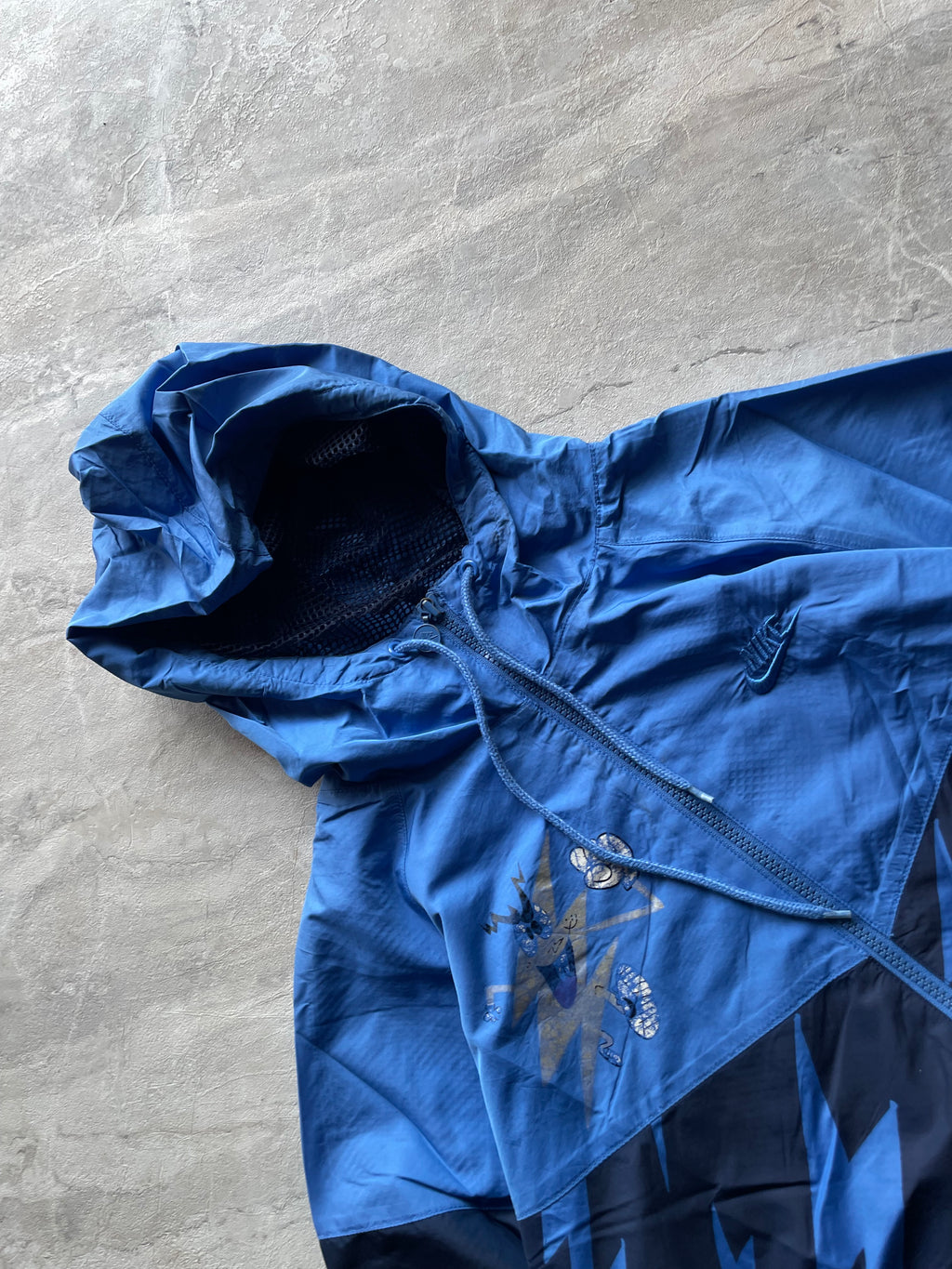 VINTAGE NIKE BLUE X TODD JAMES “THE RUNNING MAN “WINDBREAKER-