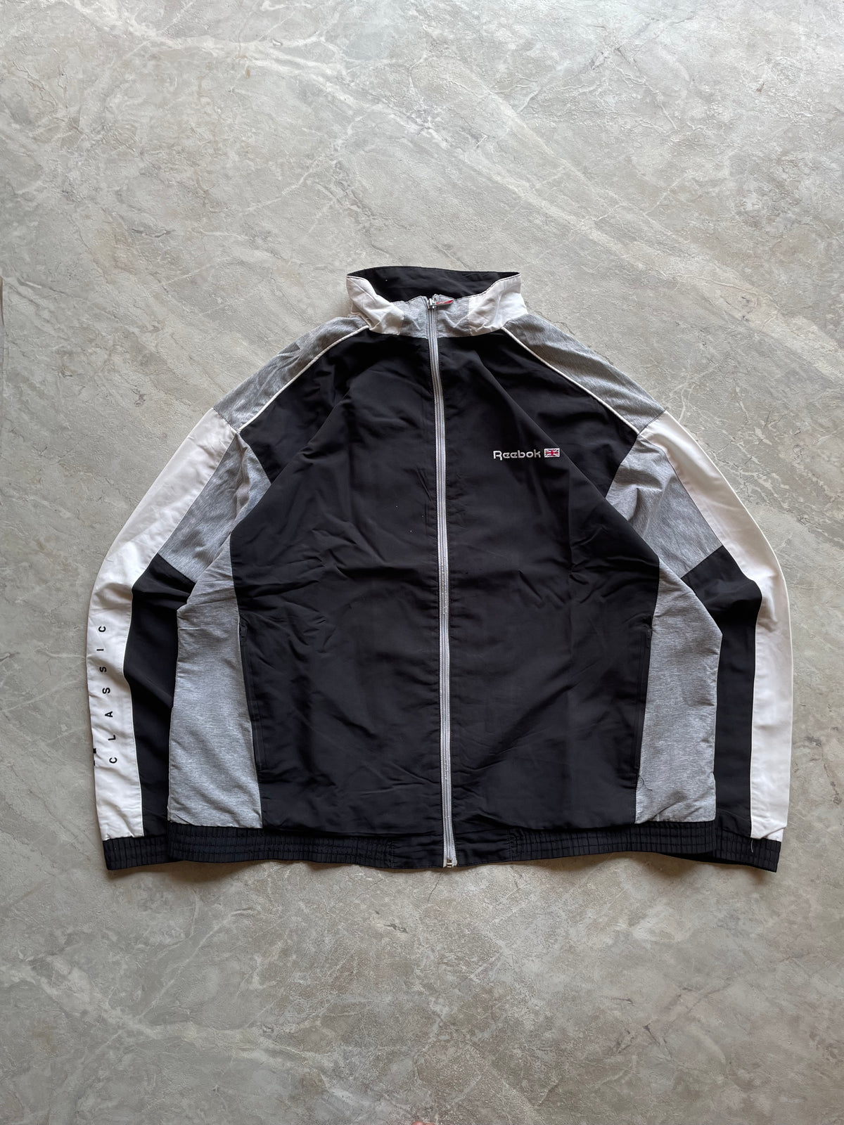 BLACK,GREY AND WHITE REEBOK TRACK JACKET-XL-2XL