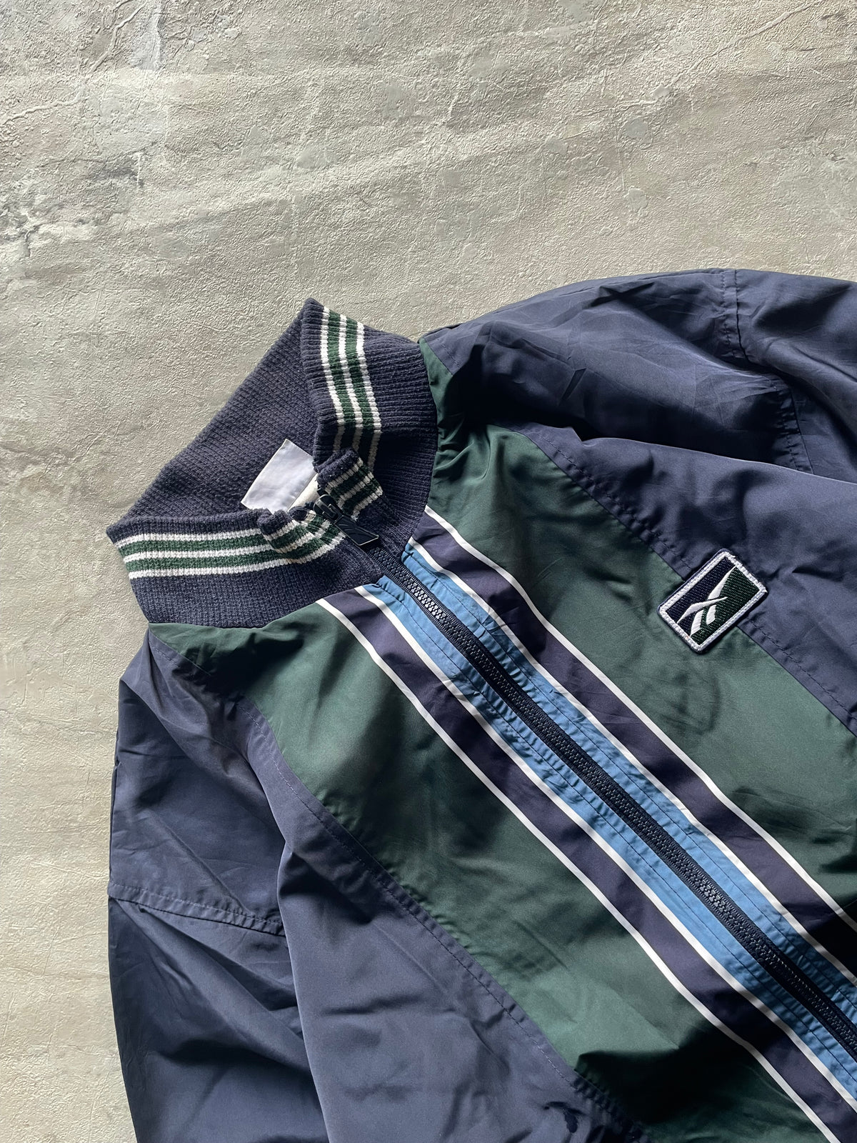NAVY BLUE AND DARK GREEN REEBOK WINDBREAKER-L
