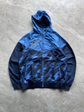VINTAGE NIKE BLUE X TODD JAMES “THE RUNNING MAN “WINDBREAKER-