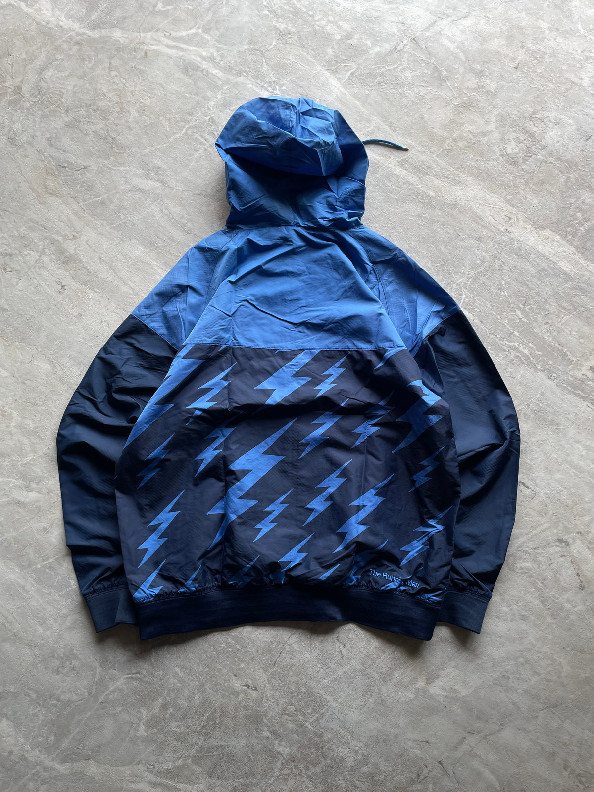 VINTAGE NIKE BLUE X TODD JAMES “THE RUNNING MAN “WINDBREAKER-